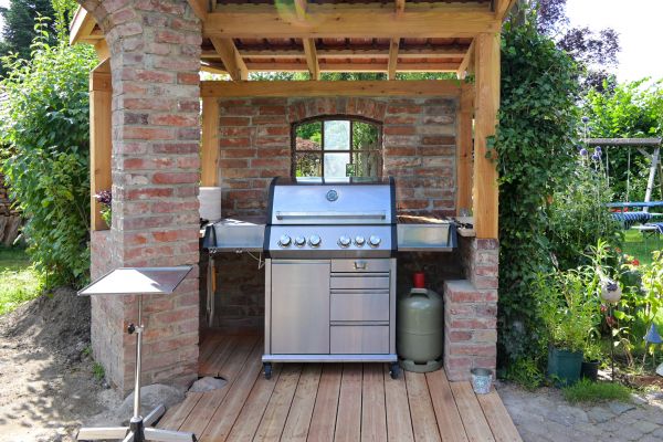 Propane Grill Assembly in Bella Vista